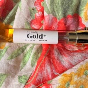 Commodity gold+  edp travel size .27 oz spray vial